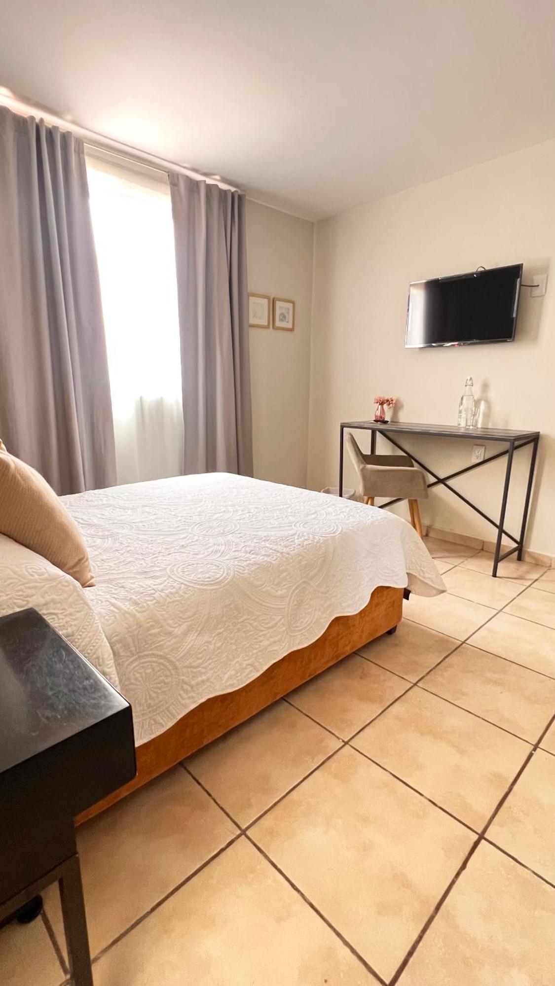 לאון Suites Ciento 37 מראה חיצוני תמונה
