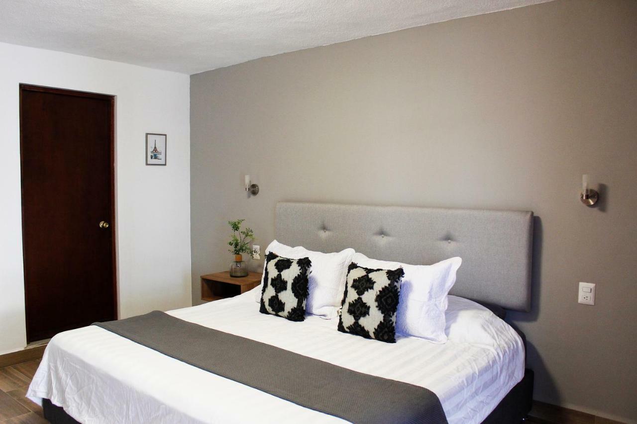 לאון Suites Ciento 37 מראה חיצוני תמונה