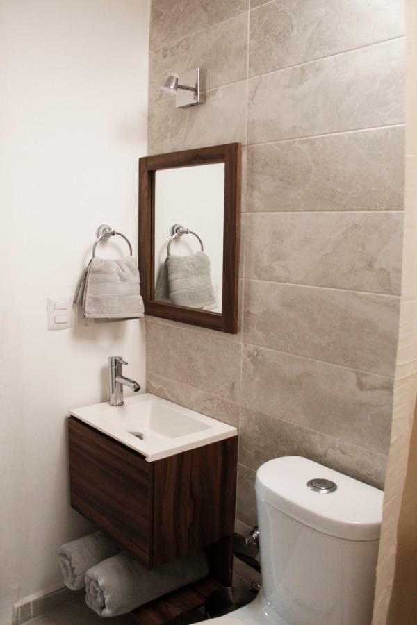 לאון Suites Ciento 37 מראה חיצוני תמונה