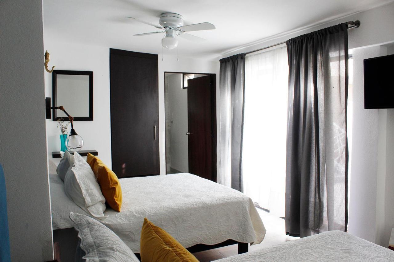 לאון Suites Ciento 37 מראה חיצוני תמונה