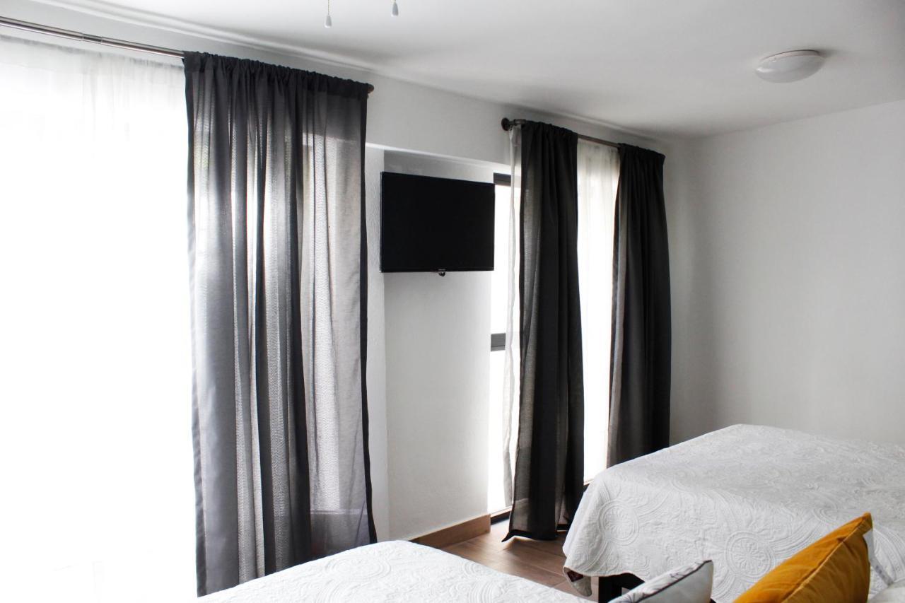 לאון Suites Ciento 37 מראה חיצוני תמונה