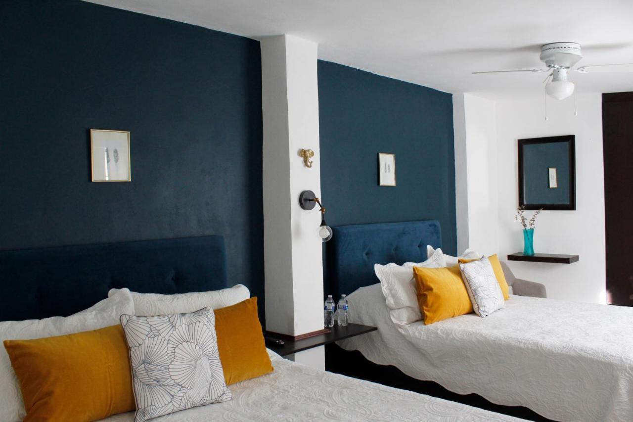 לאון Suites Ciento 37 מראה חיצוני תמונה