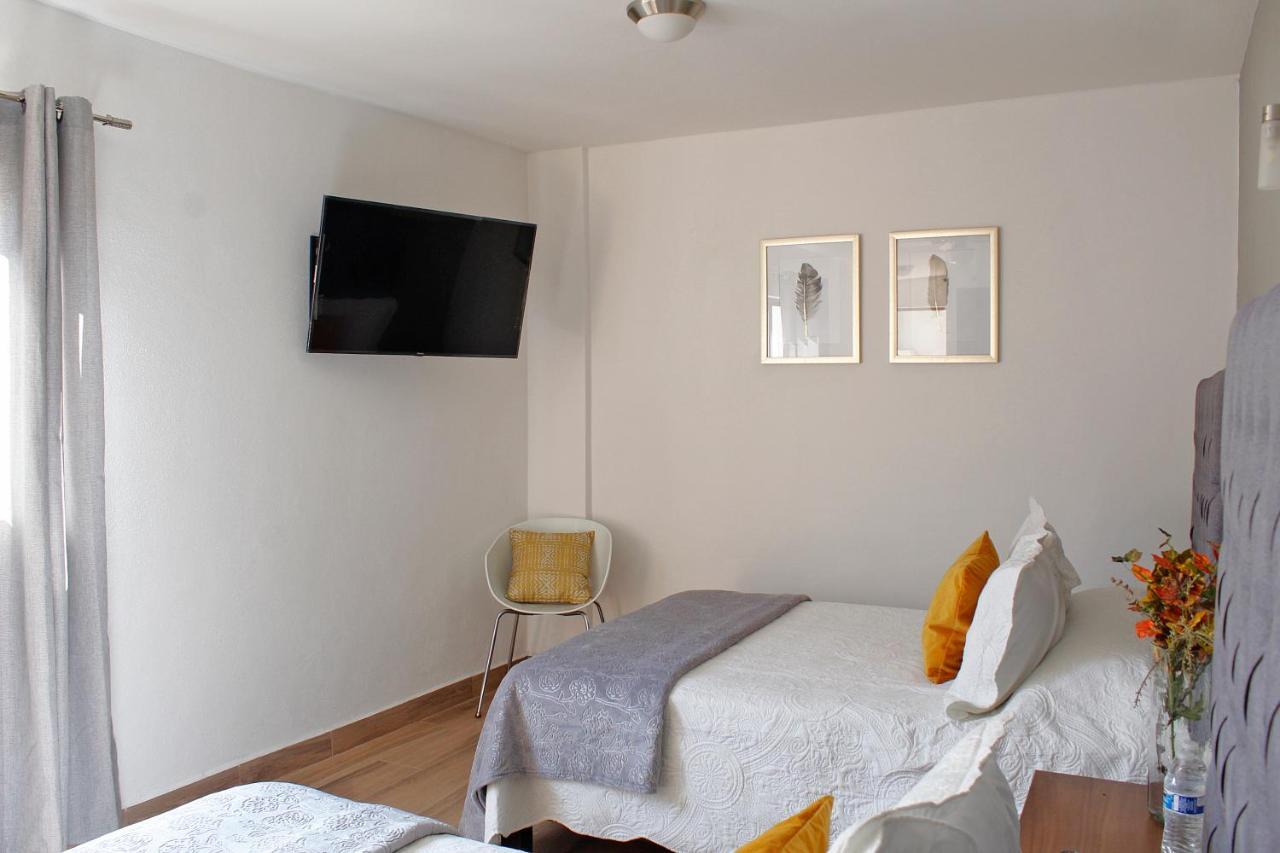 לאון Suites Ciento 37 מראה חיצוני תמונה